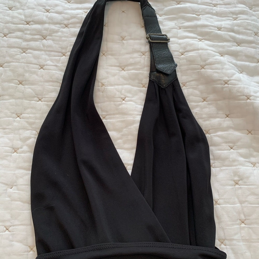Dress with leather buckle accent.